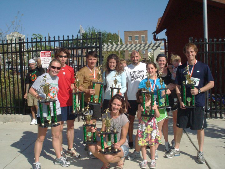 Club members picking up trophies during 2010 Two Street 5K Club members picking up trophies during 2010 Two Street 5K